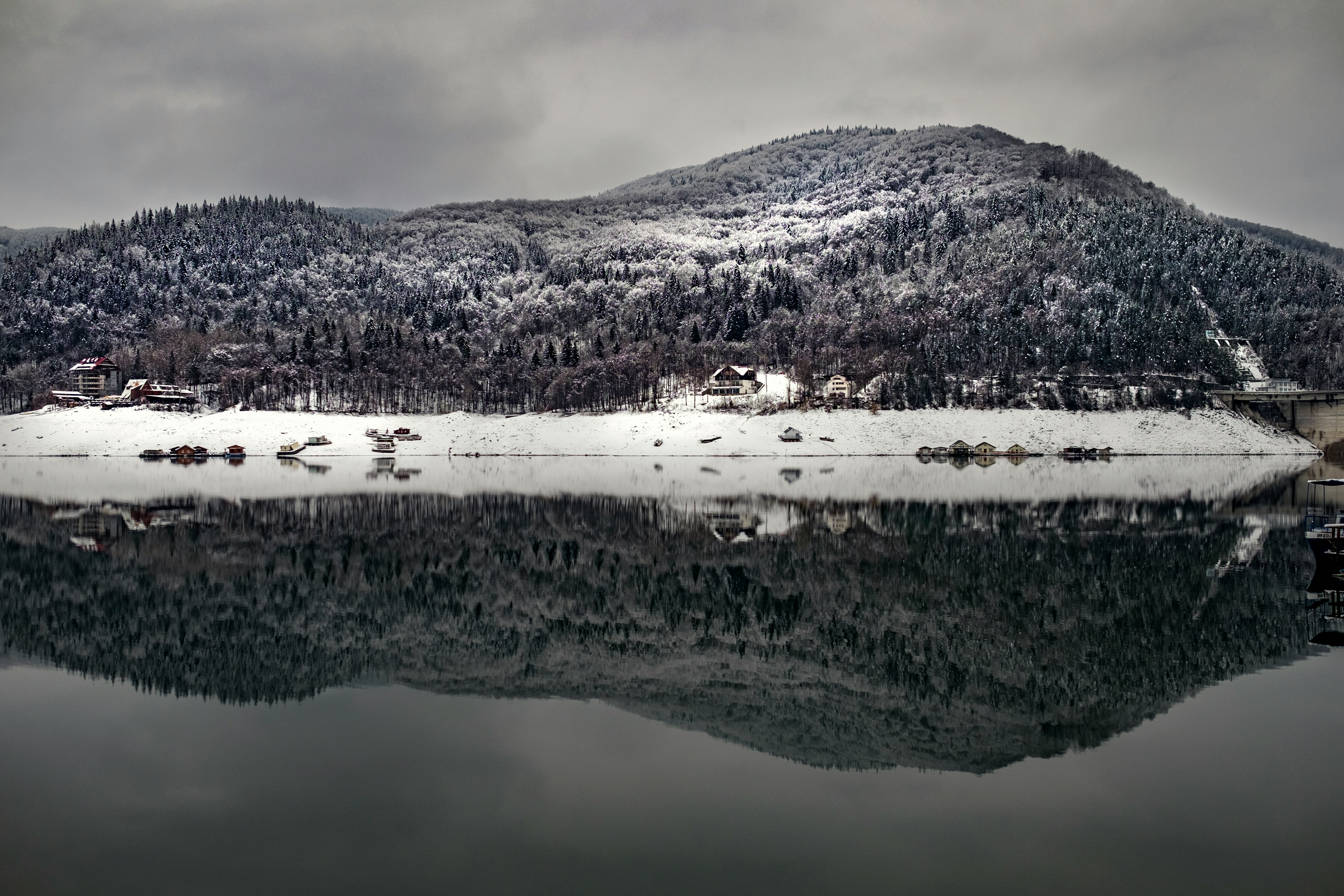 landscape photography of mountain with body of water at bottom